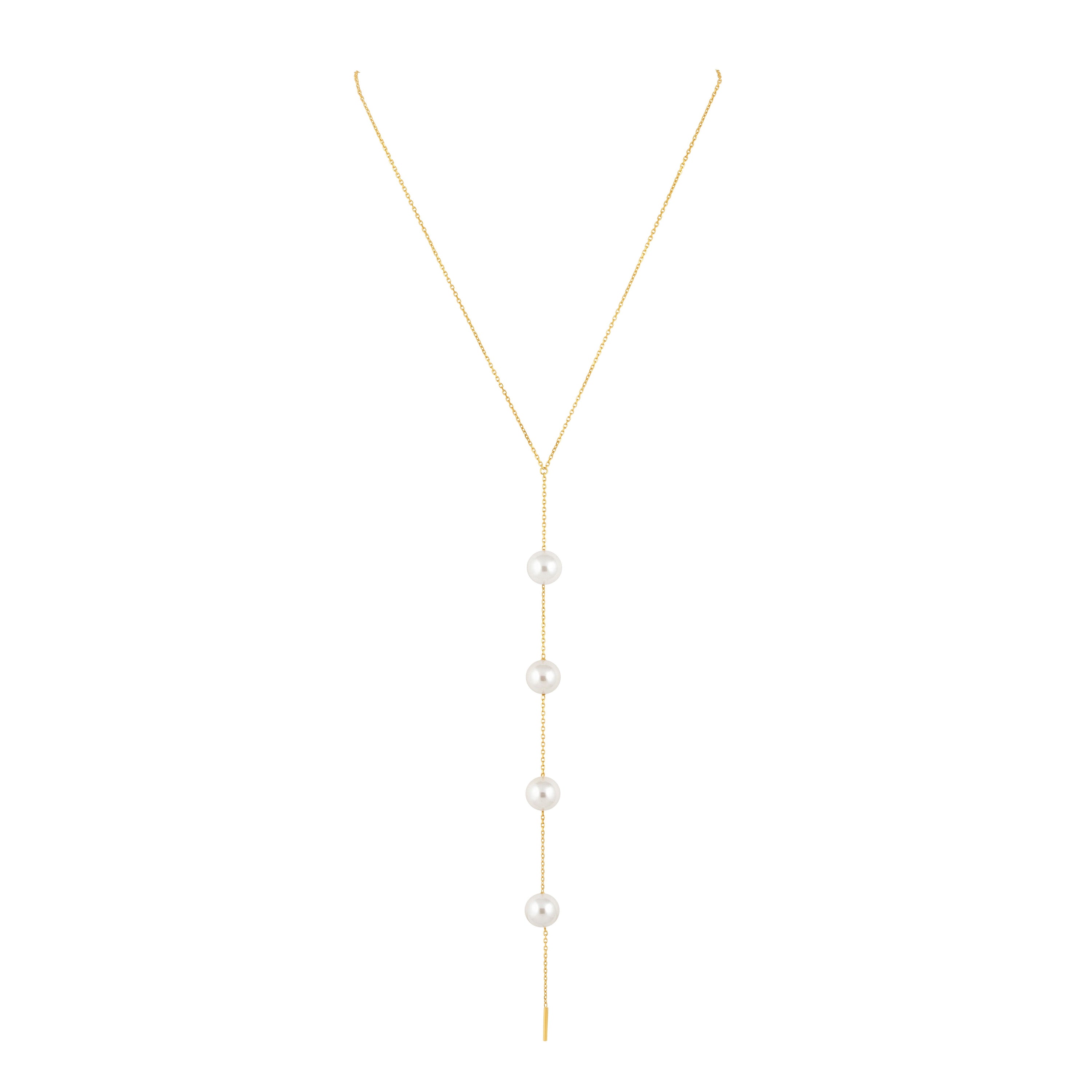 Cindy Pearl Lariat necklace featuring a 7-inch pearl drop and 18k gold plated stainless steel design.