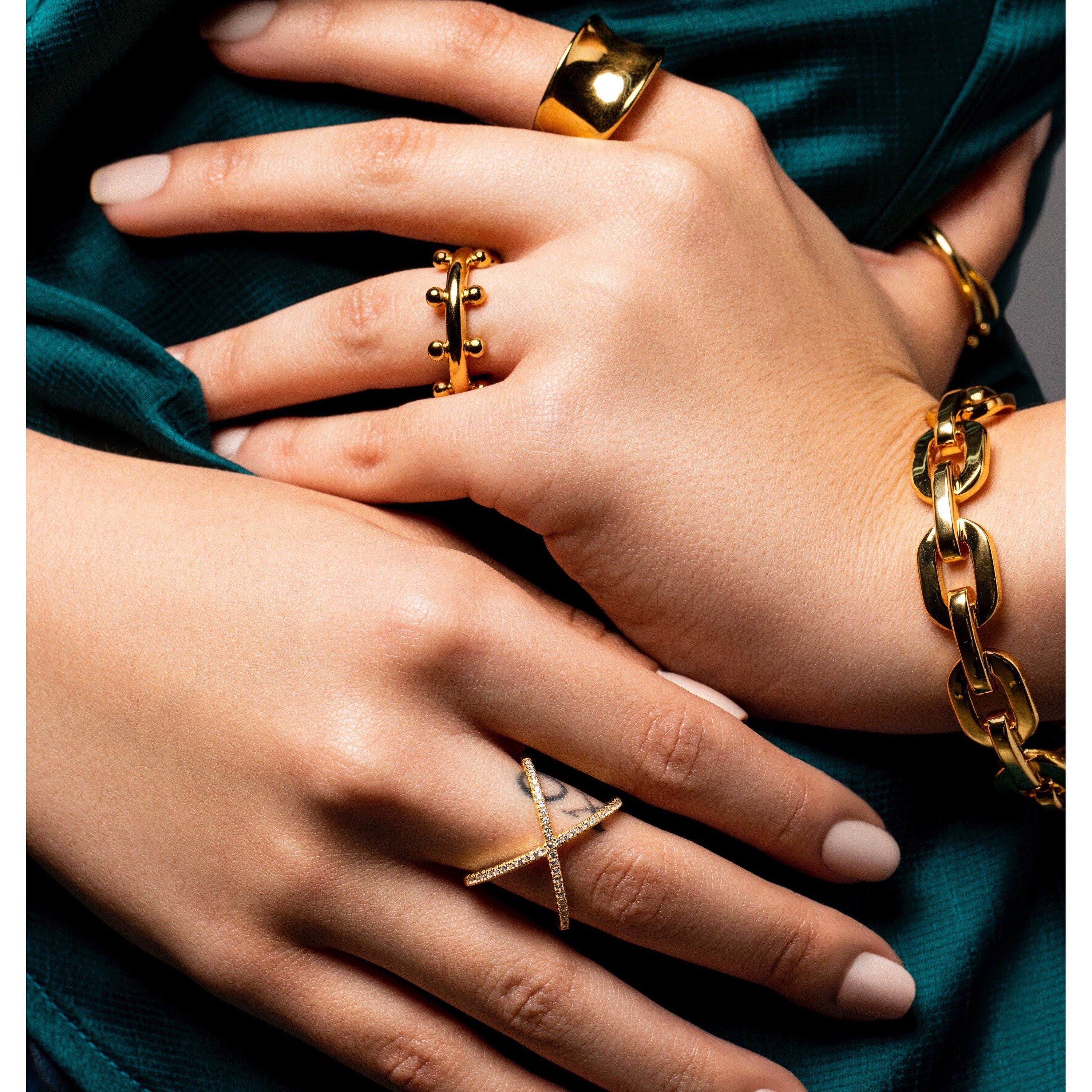 Cindy Studded Ring featuring 18k gold plating and a stylish studded design, perfect for stacking.