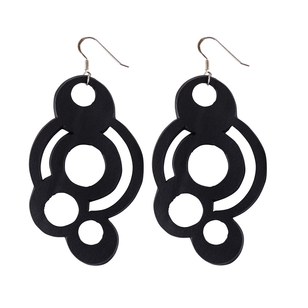 Circular Inner Tube Earrings made from reclaimed rubber, featuring a unique design with eccentric circles and sterling silver hooks.