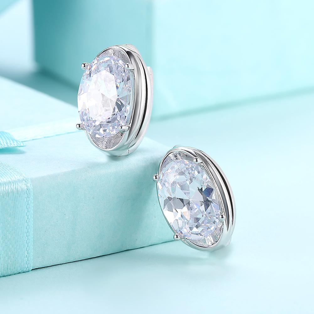 Elegant Circular Mid Elements Earrings crafted from 18K white gold, featuring certified crystals, designed for comfort and hypoallergenic wear.