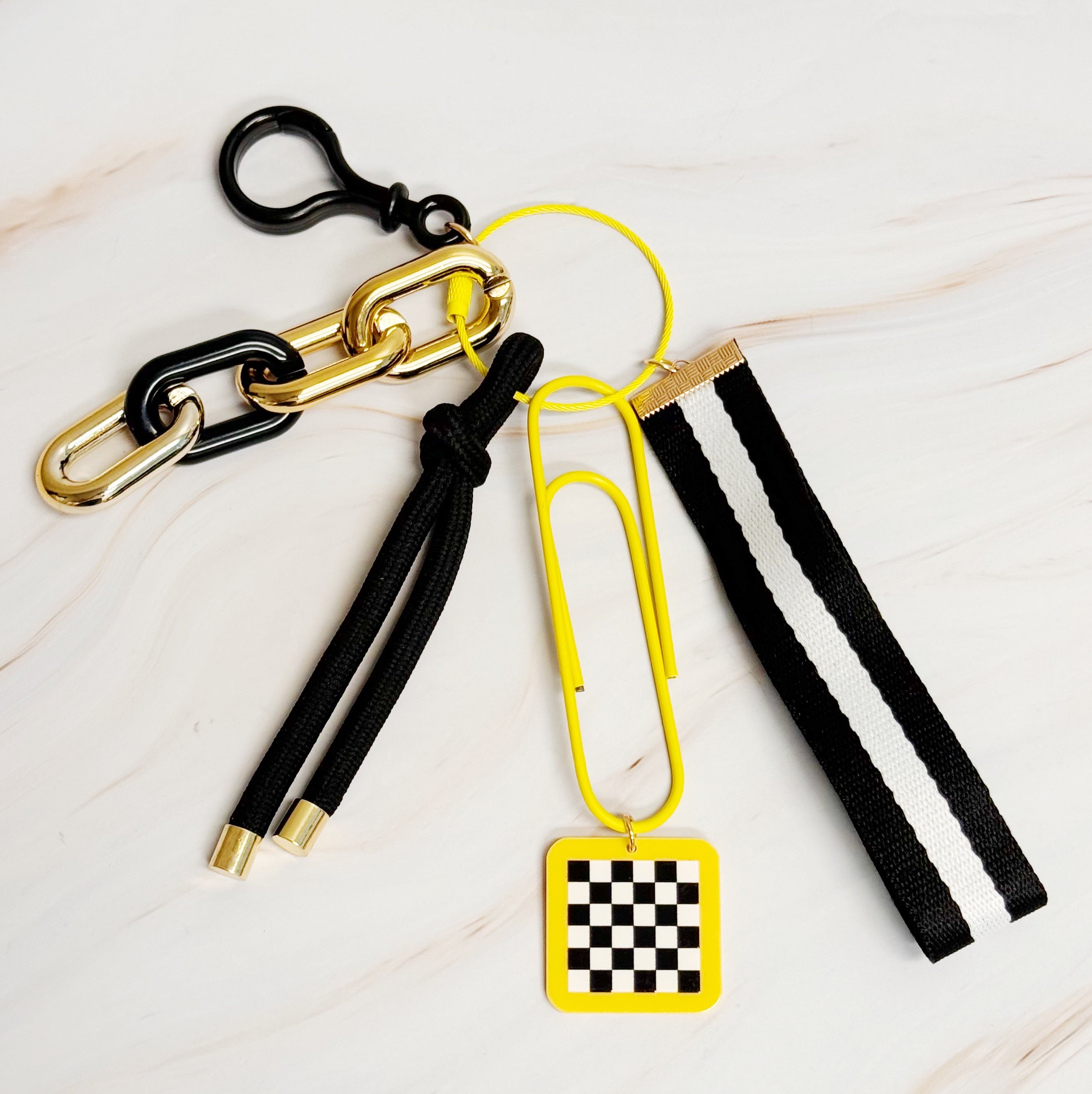 City Hip Jingle Key Chain featuring a colorful design with a wrist strap and screw locking ring, perfect for keys and bag decor.