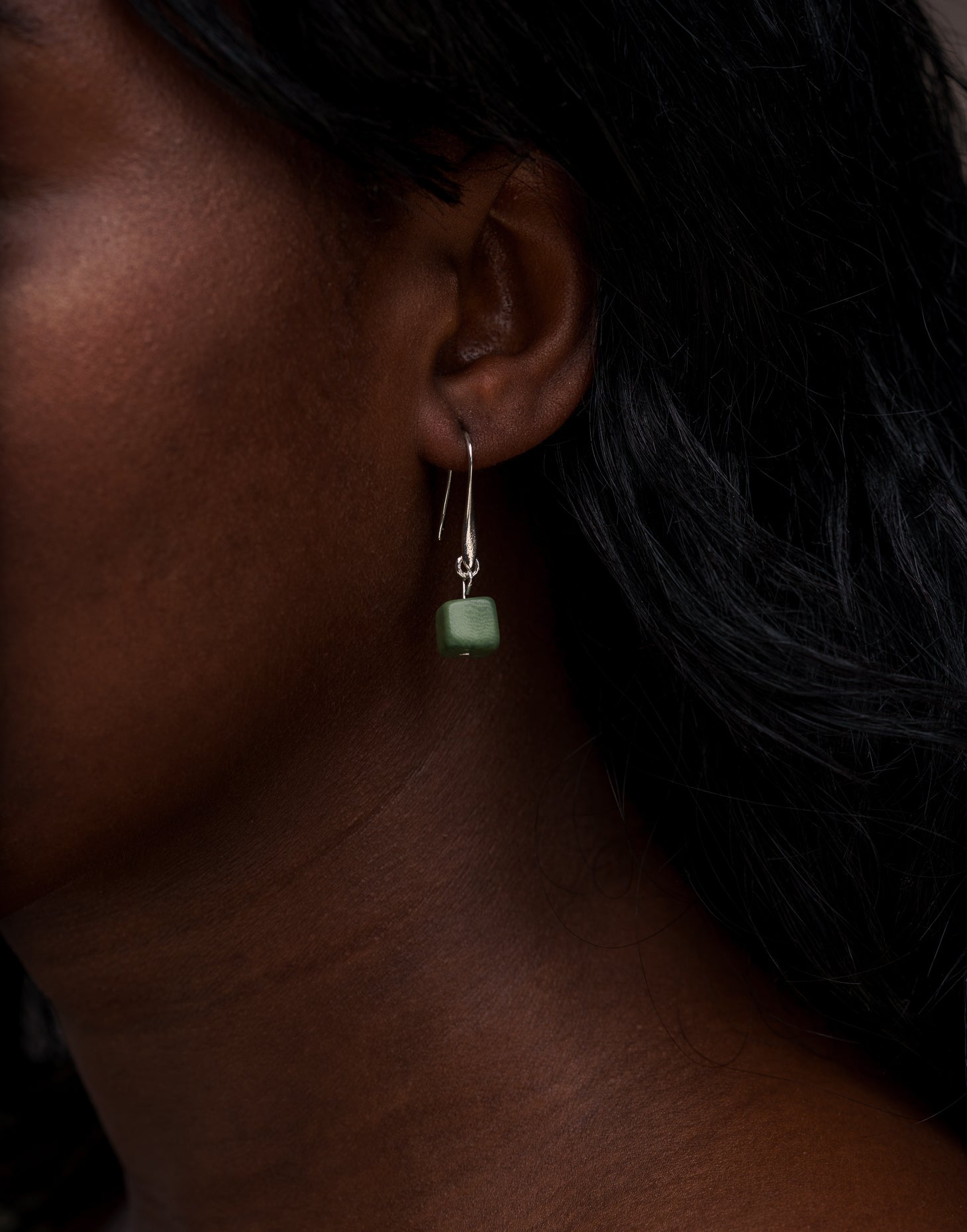 Clara Tagua Earrings featuring handmade tagua nut cubes with silver plated hooks, showcasing eco-friendly craftsmanship.