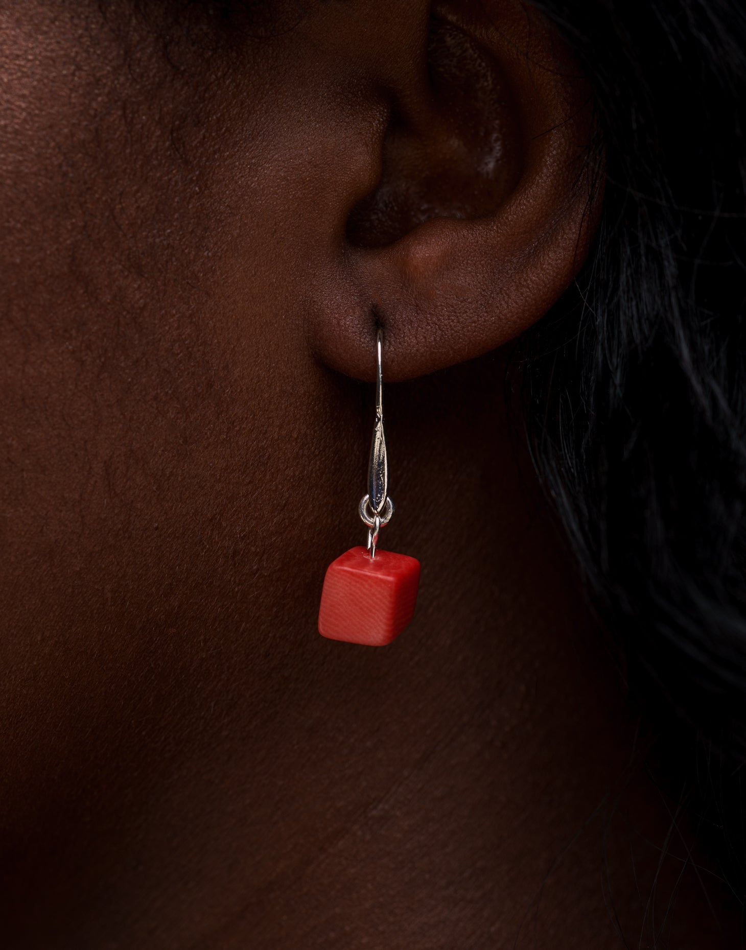 Clara Tagua Earrings featuring handmade tagua nut cubes with silver plated hooks, showcasing eco-friendly craftsmanship.