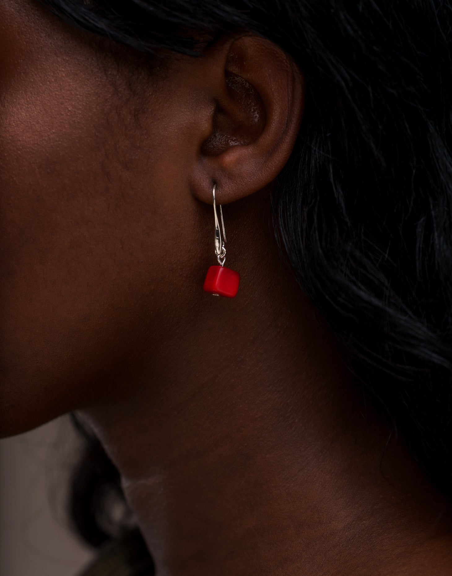 Clara Tagua Earrings featuring handmade tagua nut cubes with silver plated hooks, showcasing eco-friendly craftsmanship.