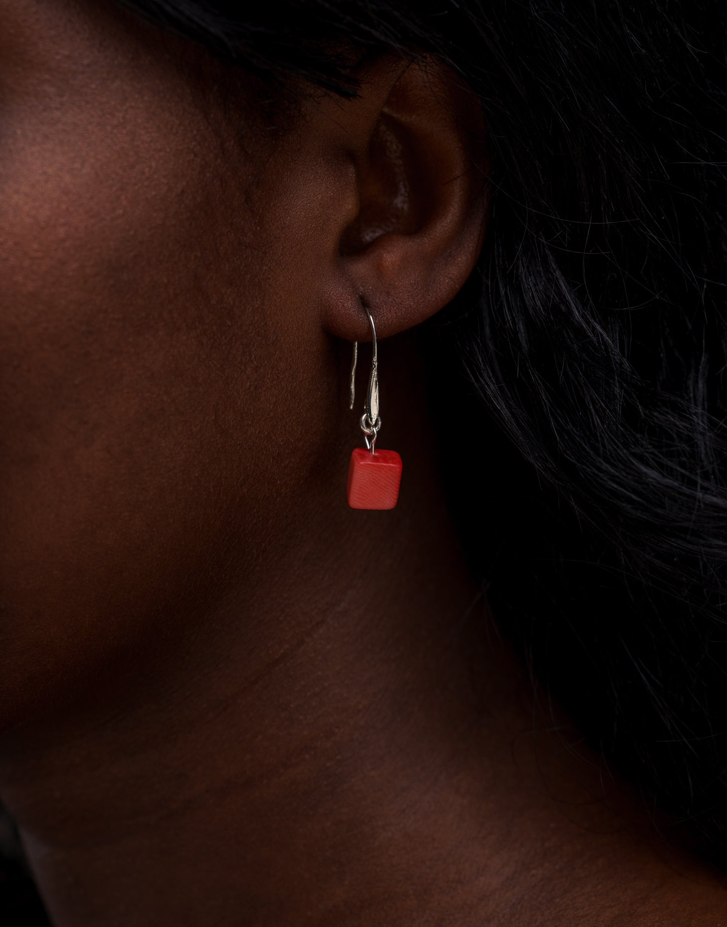 Clara Tagua Earrings featuring handmade tagua nut cubes with silver plated hooks, showcasing eco-friendly craftsmanship.