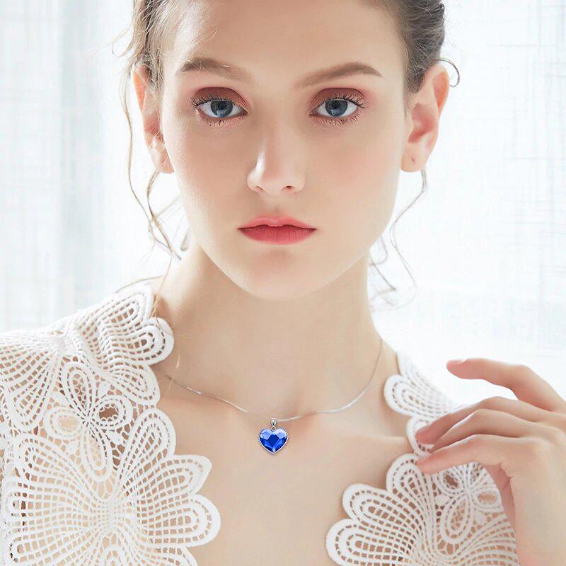 Classic Bermuda blue heart necklace designed in Italy, featuring 18K white gold plating and embellished with sparkling Austrian crystals.