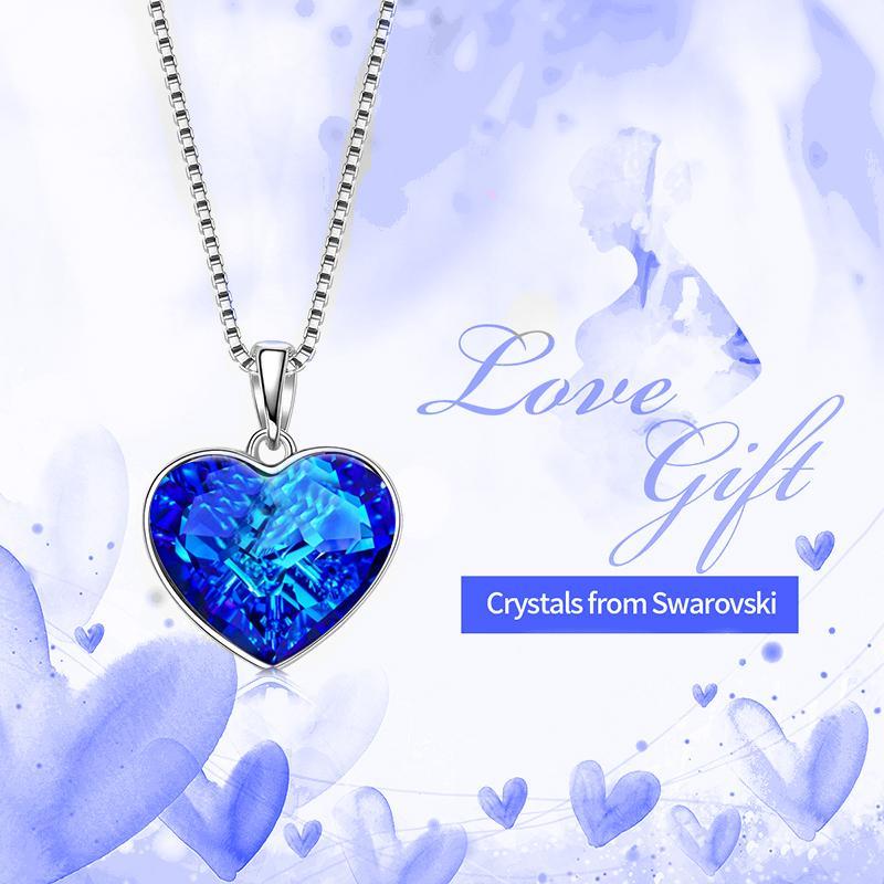 Classic Bermuda blue heart necklace designed in Italy, featuring 18K white gold plating and embellished with sparkling Austrian crystals.