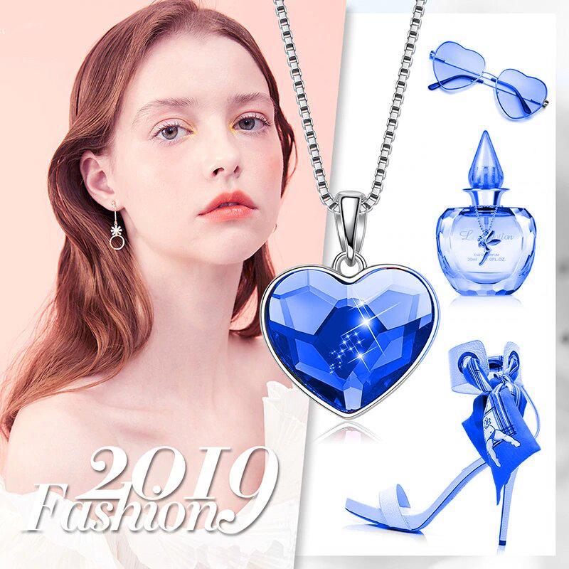 Classic Bermuda blue heart necklace designed in Italy, featuring 18K white gold plating and embellished with sparkling Austrian crystals.