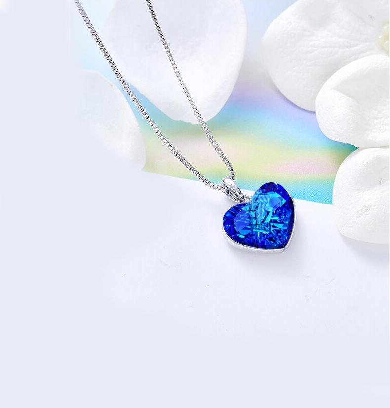 Classic Bermuda blue heart necklace designed in Italy, featuring 18K white gold plating and embellished with sparkling Austrian crystals.