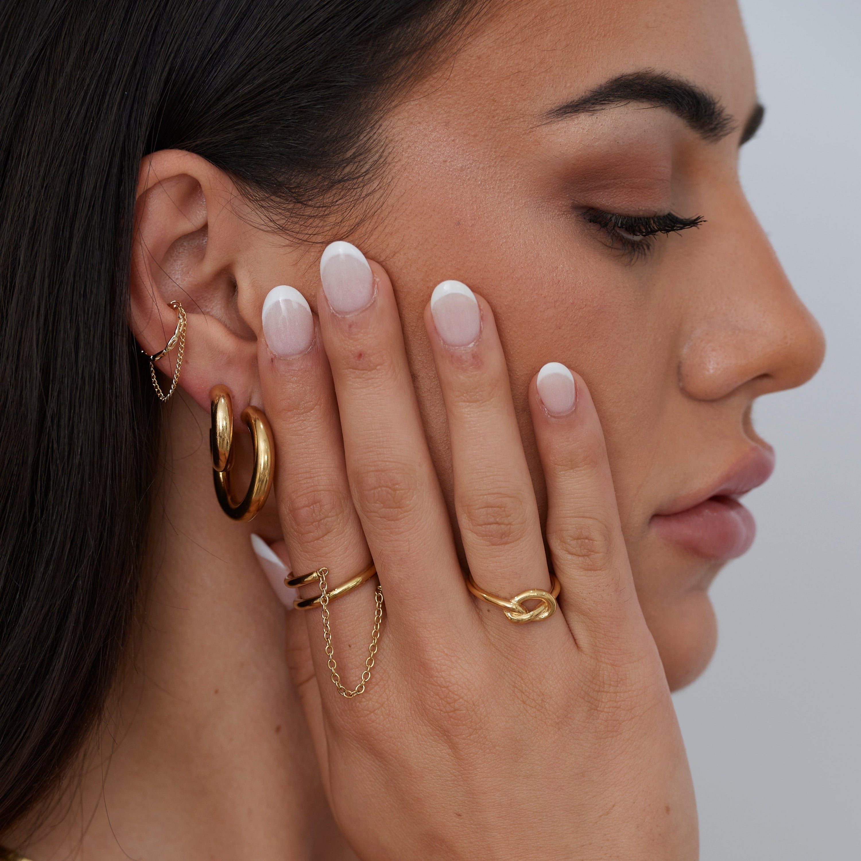 SJD Classic Hoop Earring Set featuring Anya and Chloe Mini Hoops in 18k gold plating, showcasing their elegant design.