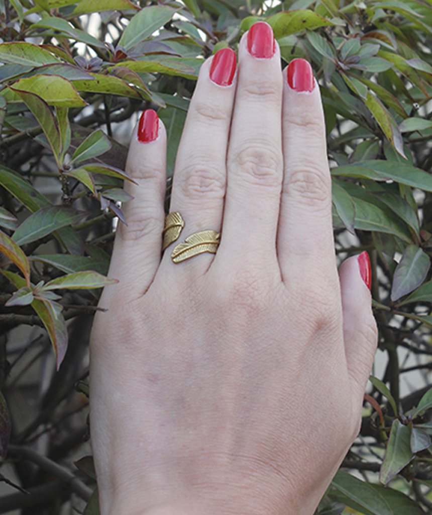 Classic Leaf Ring featuring a tropical leaf design, available in silver and gold, adjustable size for all fingers.