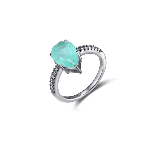 Classic pear shape tourmaline paraiba ring in sterling silver with white gold finish, featuring a vibrant sea blue paraiba stone.