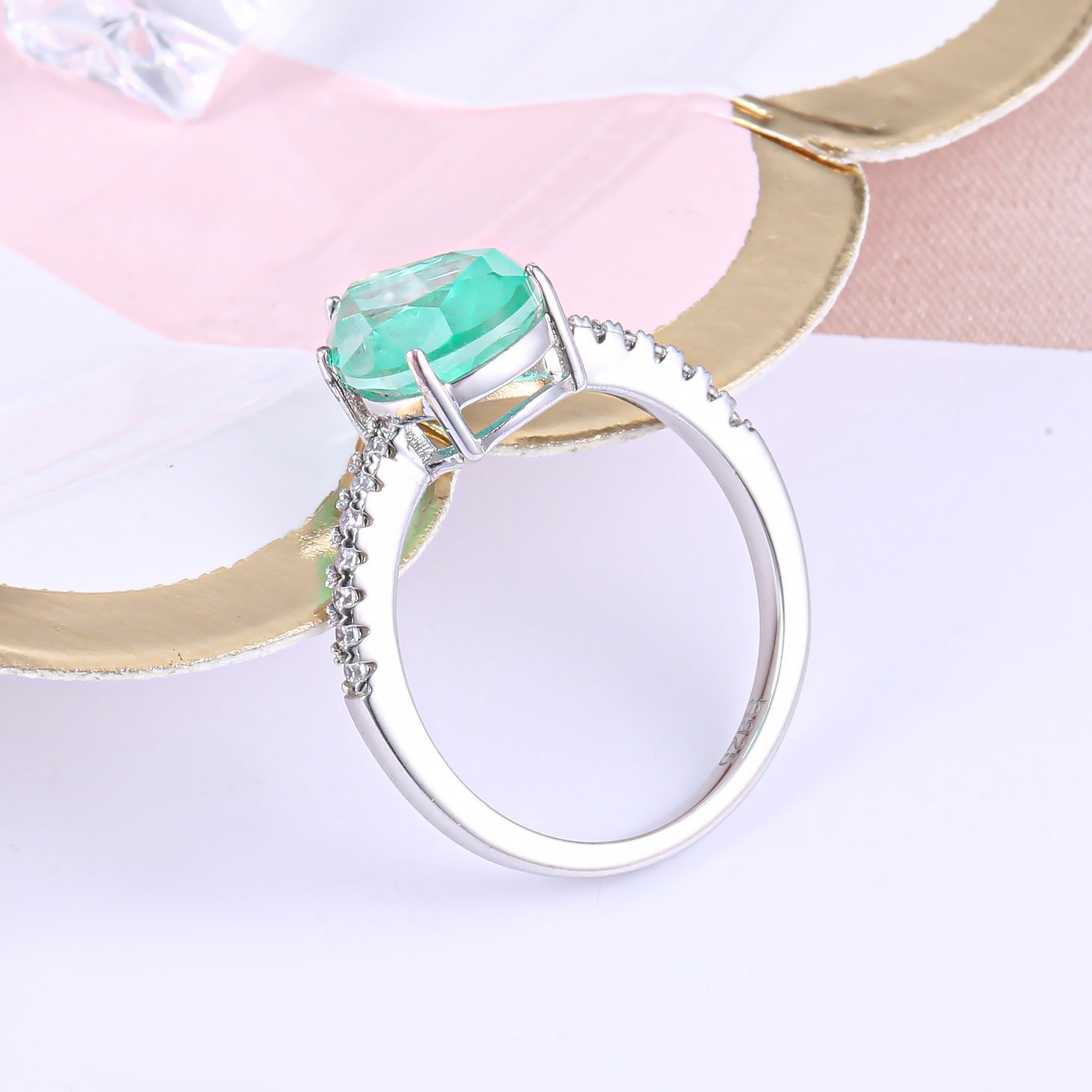 Classic pear shape tourmaline paraiba ring in sterling silver with white gold finish, featuring a vibrant sea blue paraiba stone.