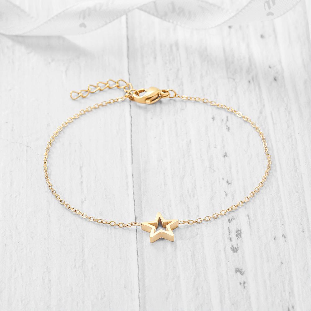 Classic Star Charm Bracelet made of surgical stainless steel with gold plating, featuring star charms.