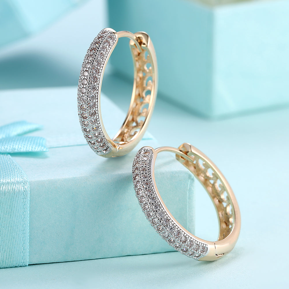 Classic Triple Row Huggie Earring in 18K Gold Plated, showcasing a luxurious design with three rows of shimmering gold.