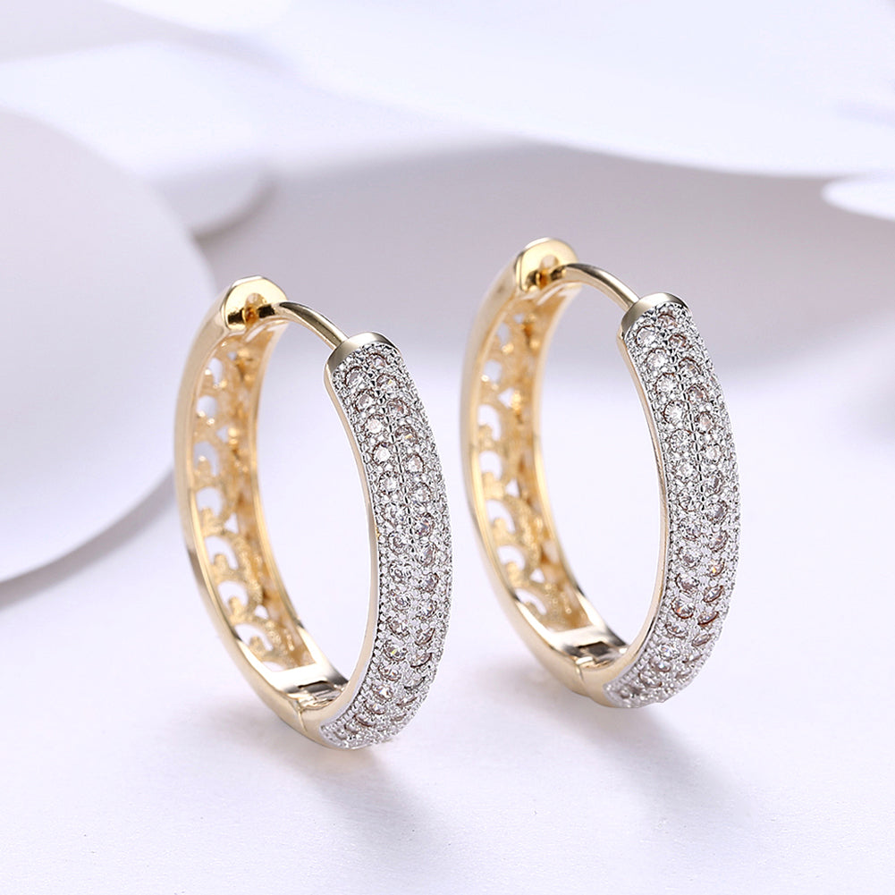 Classic Triple Row Huggie Earring in 18K Gold Plated, showcasing a luxurious design with three rows of shimmering gold.