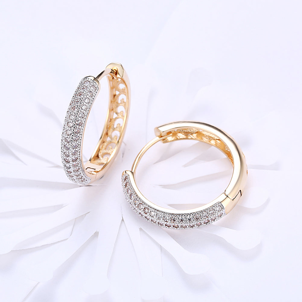 Classic Triple Row Huggie Earring in 18K Gold Plated, showcasing a luxurious design with three rows of shimmering gold.