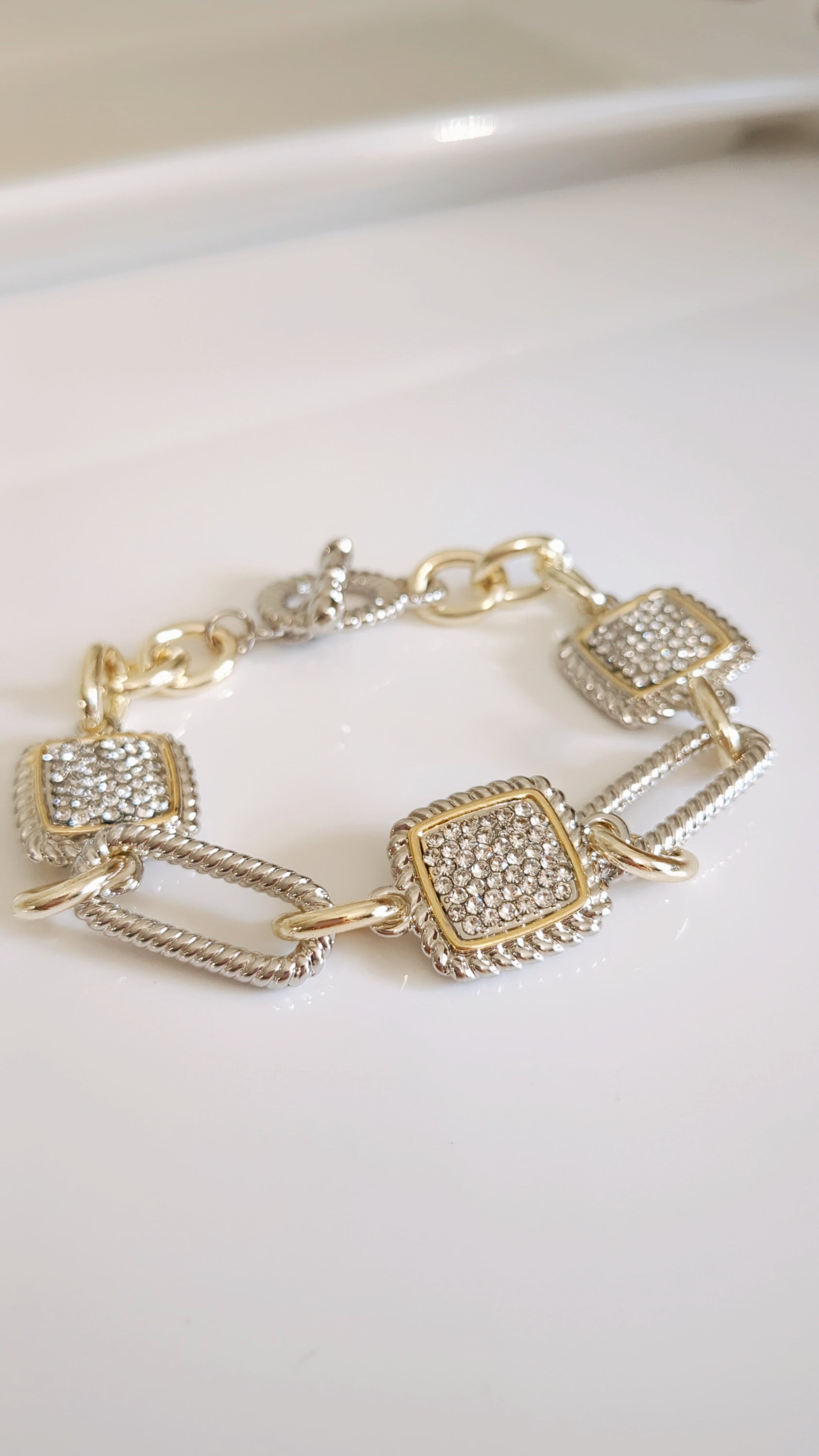 A stylish Classy Cable Bracelet featuring a delicate cable pattern, made from stainless steel with rhodium plating, perfect for stacking or everyday wear.