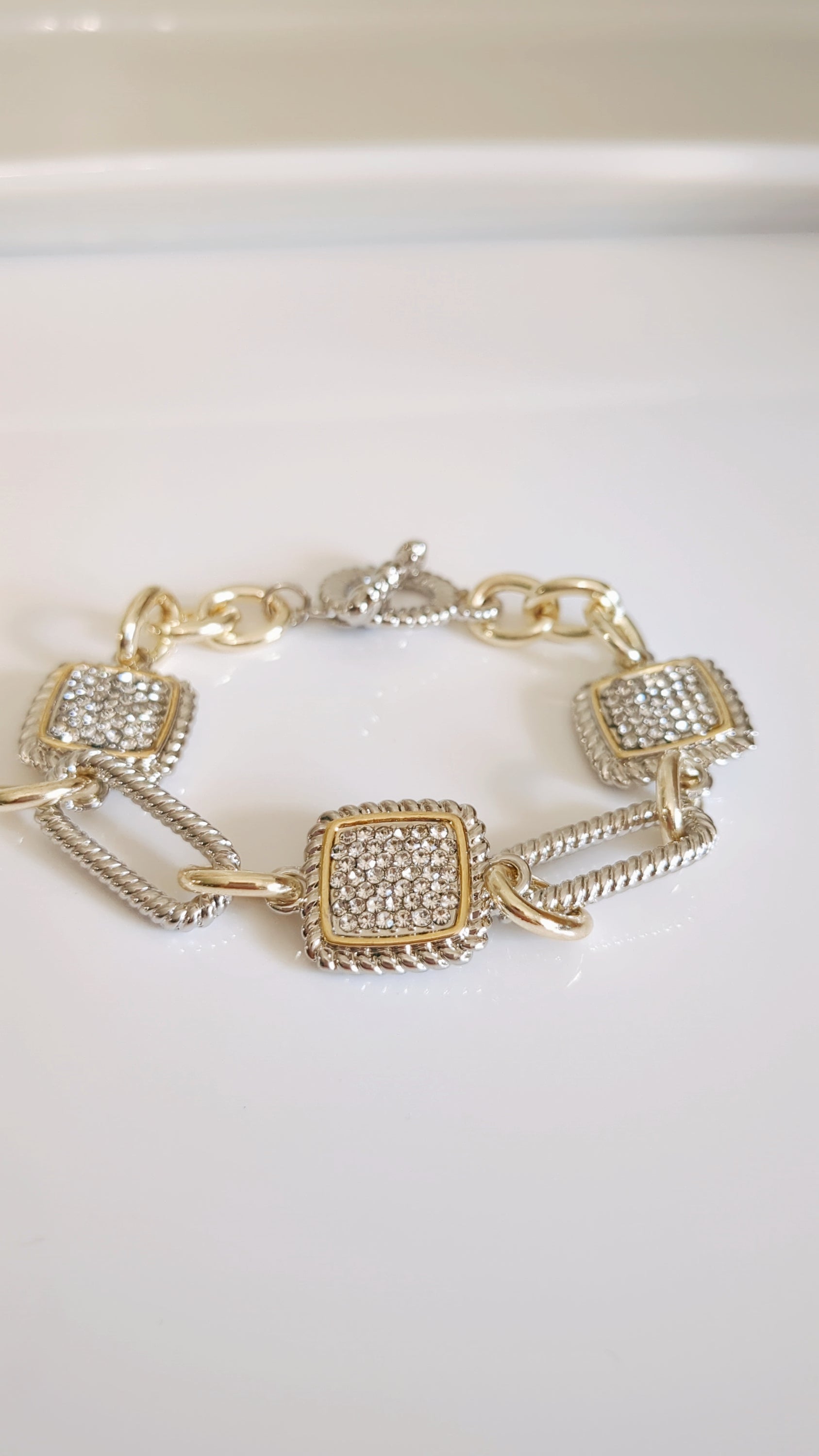 A stylish Classy Cable Bracelet featuring a delicate cable pattern, made from stainless steel with rhodium plating, perfect for stacking or everyday wear.