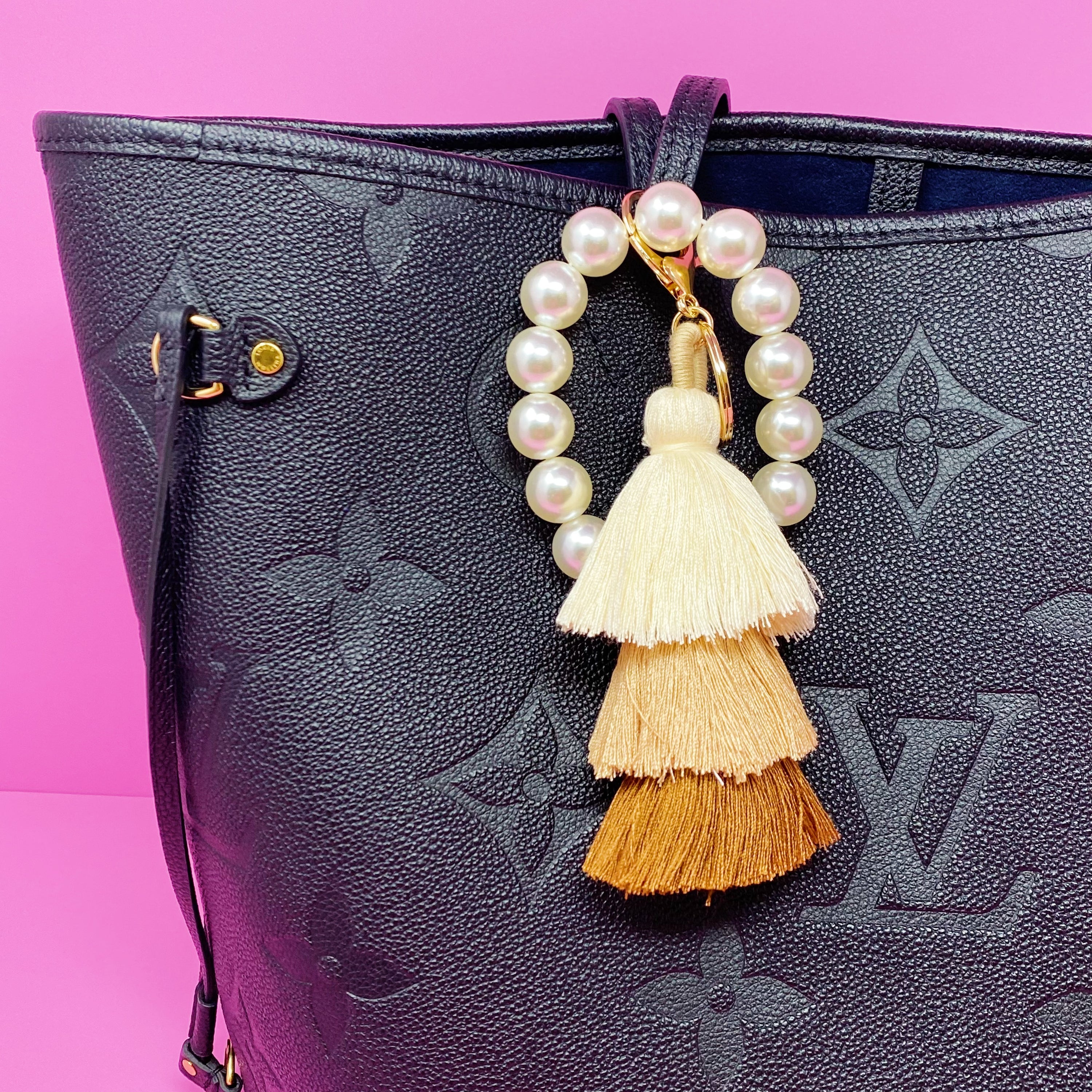 Classy Girl Pearl Tassel Key Chain featuring a large pearl bead handle and a chic 3-tier tassel drop with gold hardware.