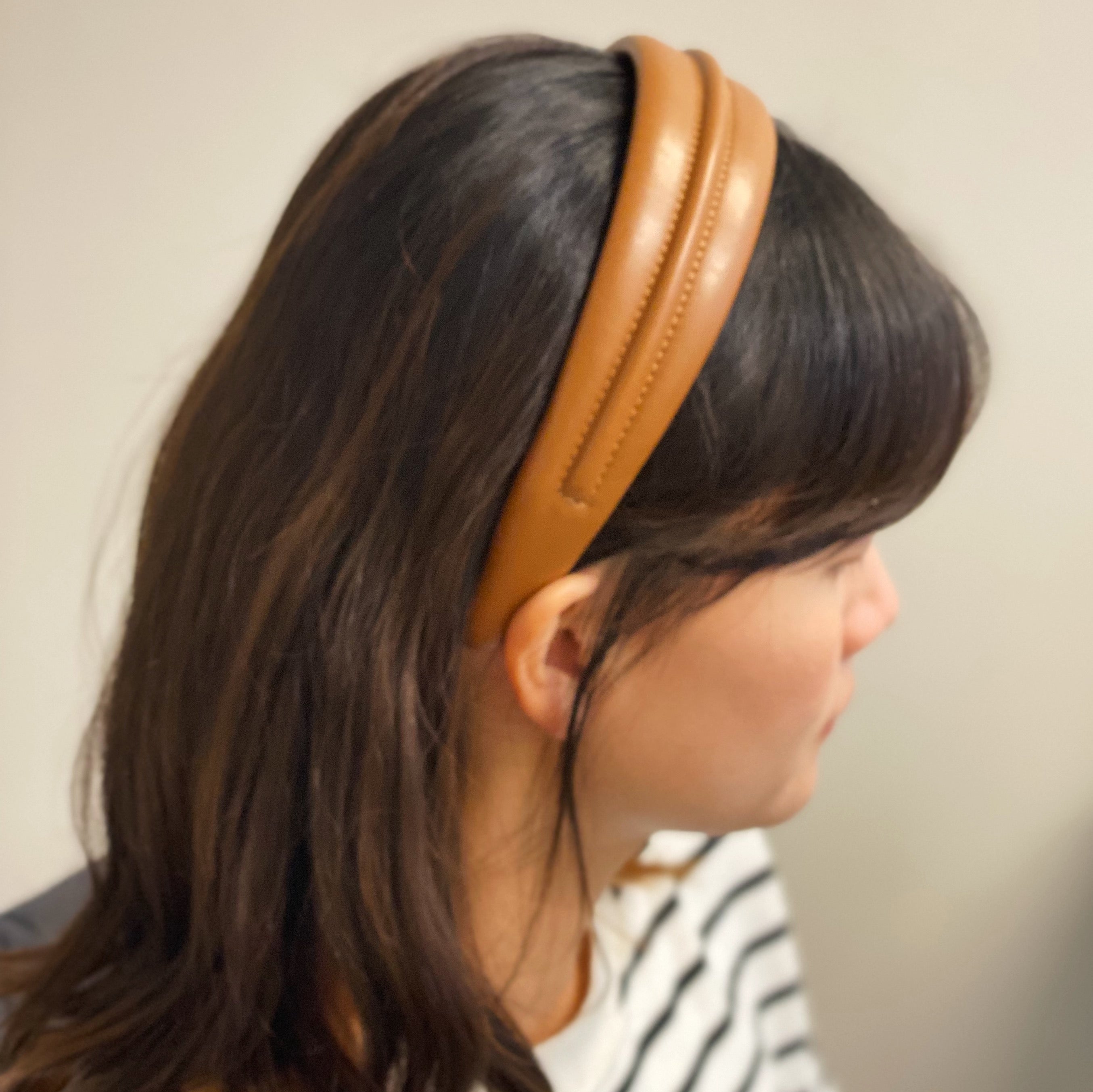 Classy Vegan Leather Headband in sleek design, showcasing soft edges and high-quality faux leather material.