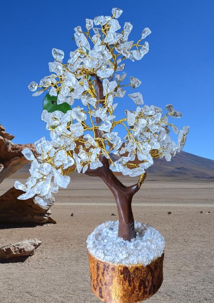 A beautifully handcrafted Clear Quartz Gemstone Tree featuring 300 natural quartz chips on a sturdy wooden base, standing 8-9 inches tall.