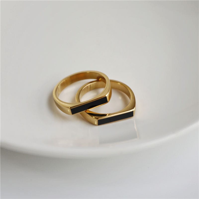 Clementine Dainty Signet Ring featuring black enamel and mother of pearl, set in 18k gold plated stainless steel.