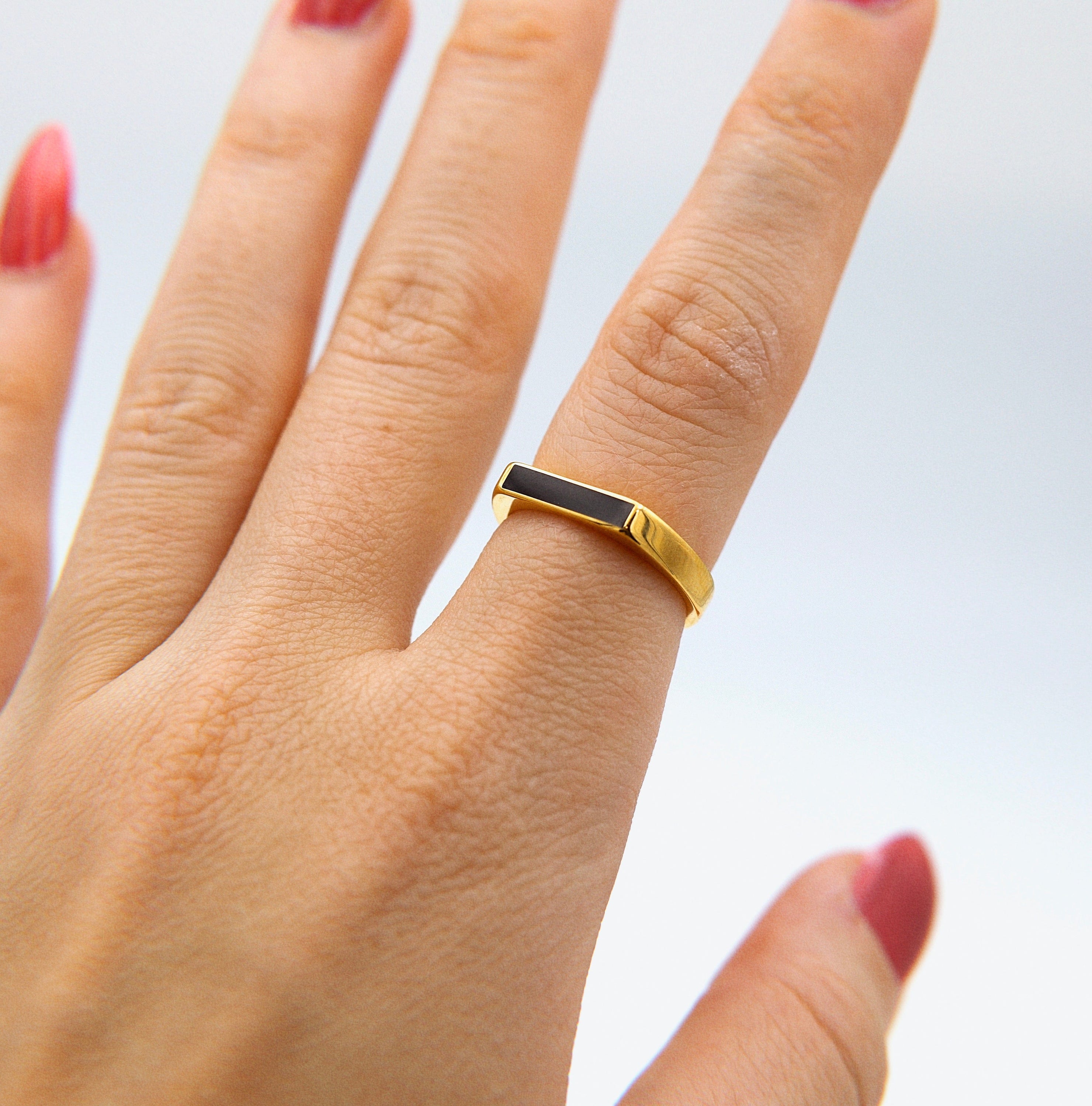 Clementine Dainty Signet Ring featuring black enamel and mother of pearl, set in 18k gold plated stainless steel.