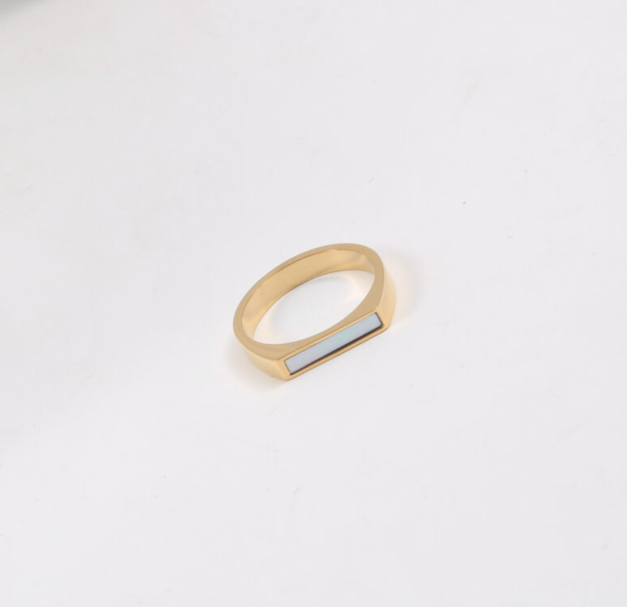 Clementine Dainty Signet Ring featuring black enamel and mother of pearl, set in 18k gold plated stainless steel.