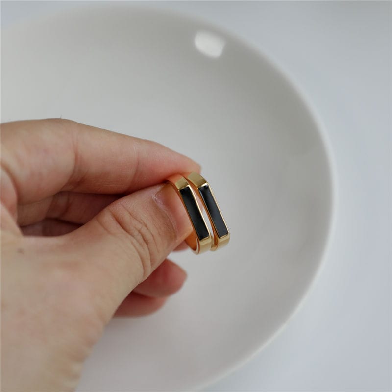 Clementine Dainty Signet Ring featuring black enamel and mother of pearl, set in 18k gold plated stainless steel.