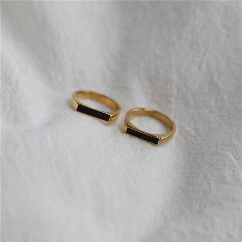 Clementine Dainty Signet Ring featuring black enamel and mother of pearl, set in 18k gold plated stainless steel.