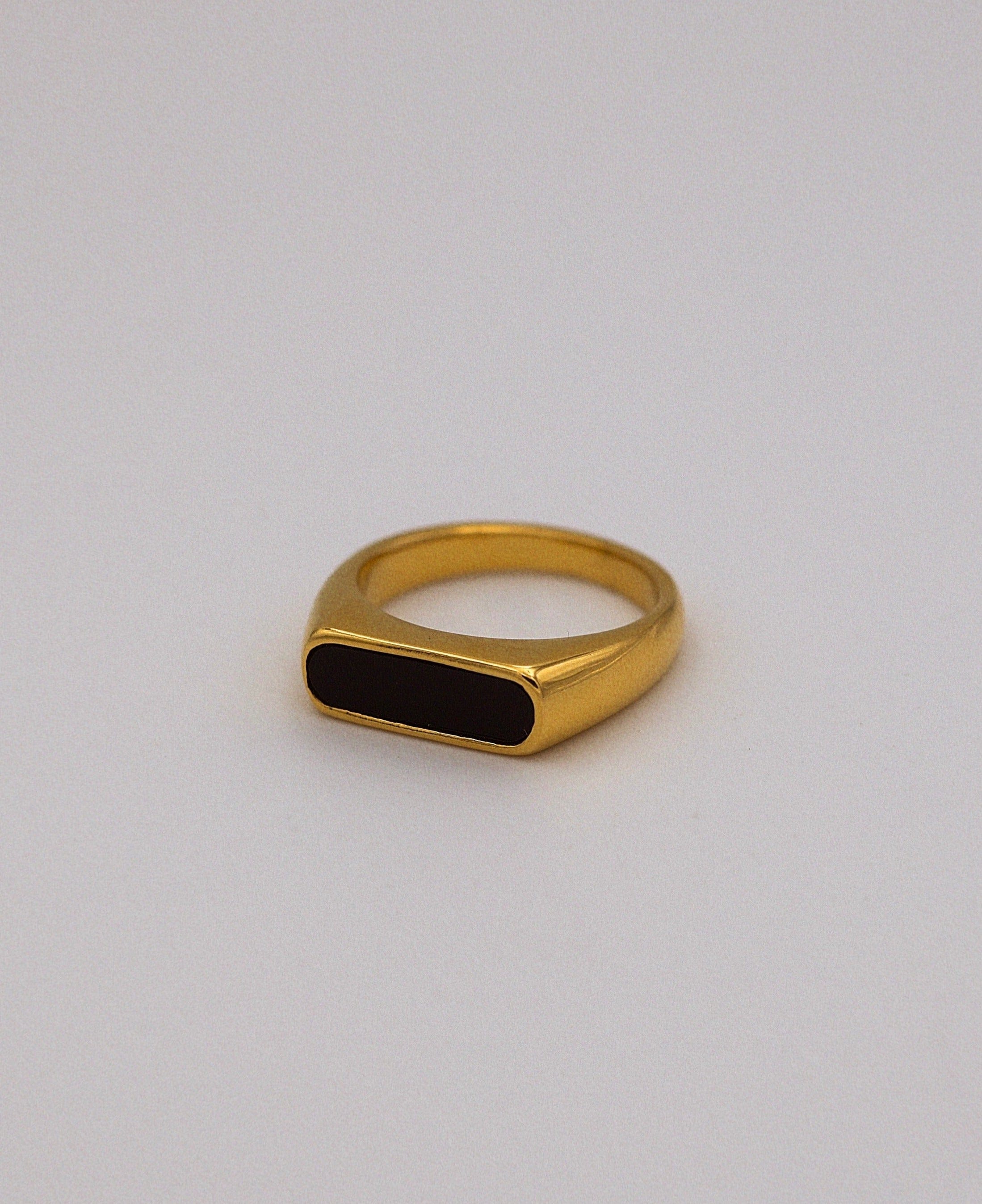 Clementine Thin Signet Enamel Ring featuring a minimalist geometric design with black enamel stone and 18k gold plated stainless steel.