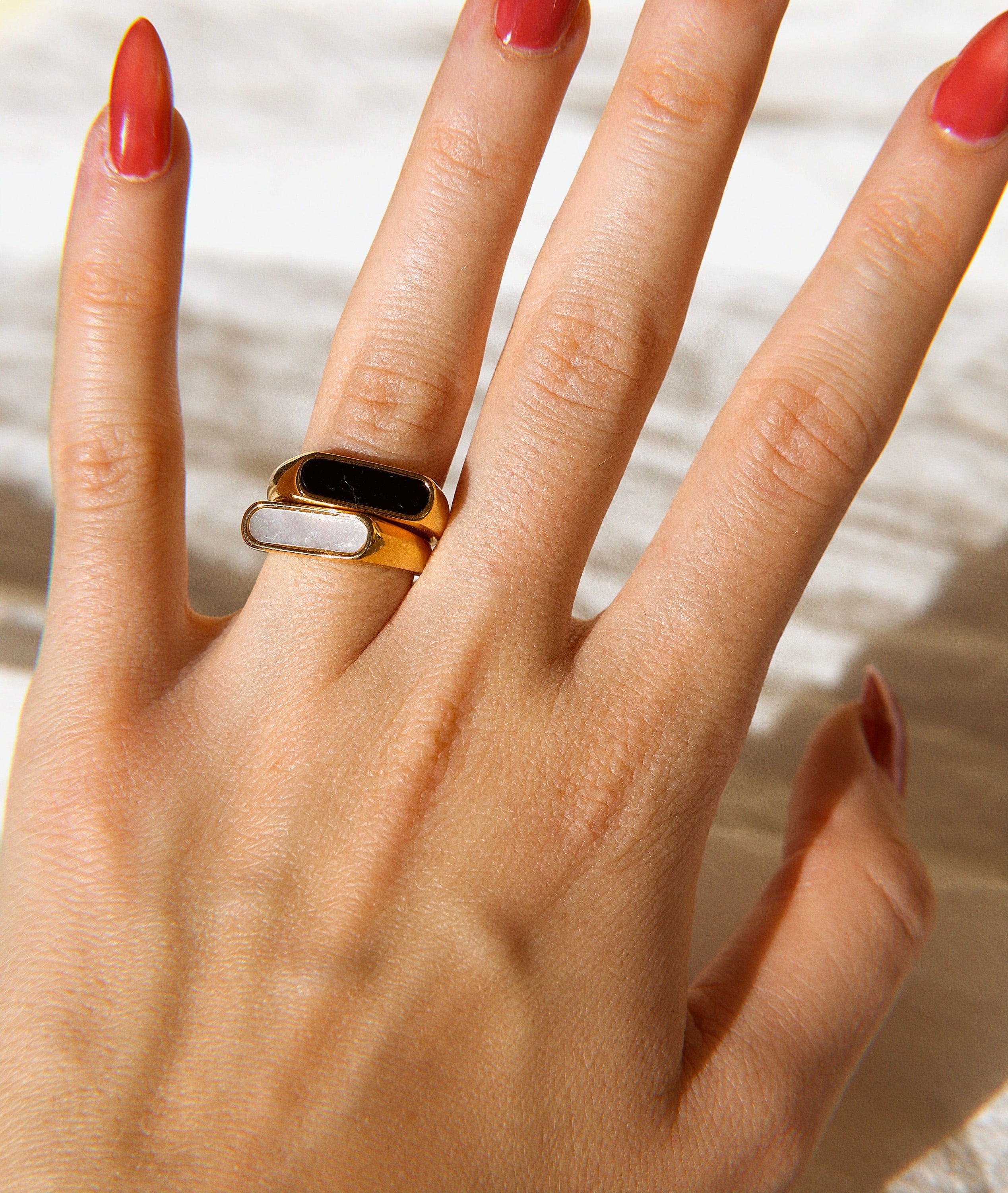 Clementine Thin Signet Enamel Ring featuring a minimalist geometric design with black enamel stone and 18k gold plated stainless steel.