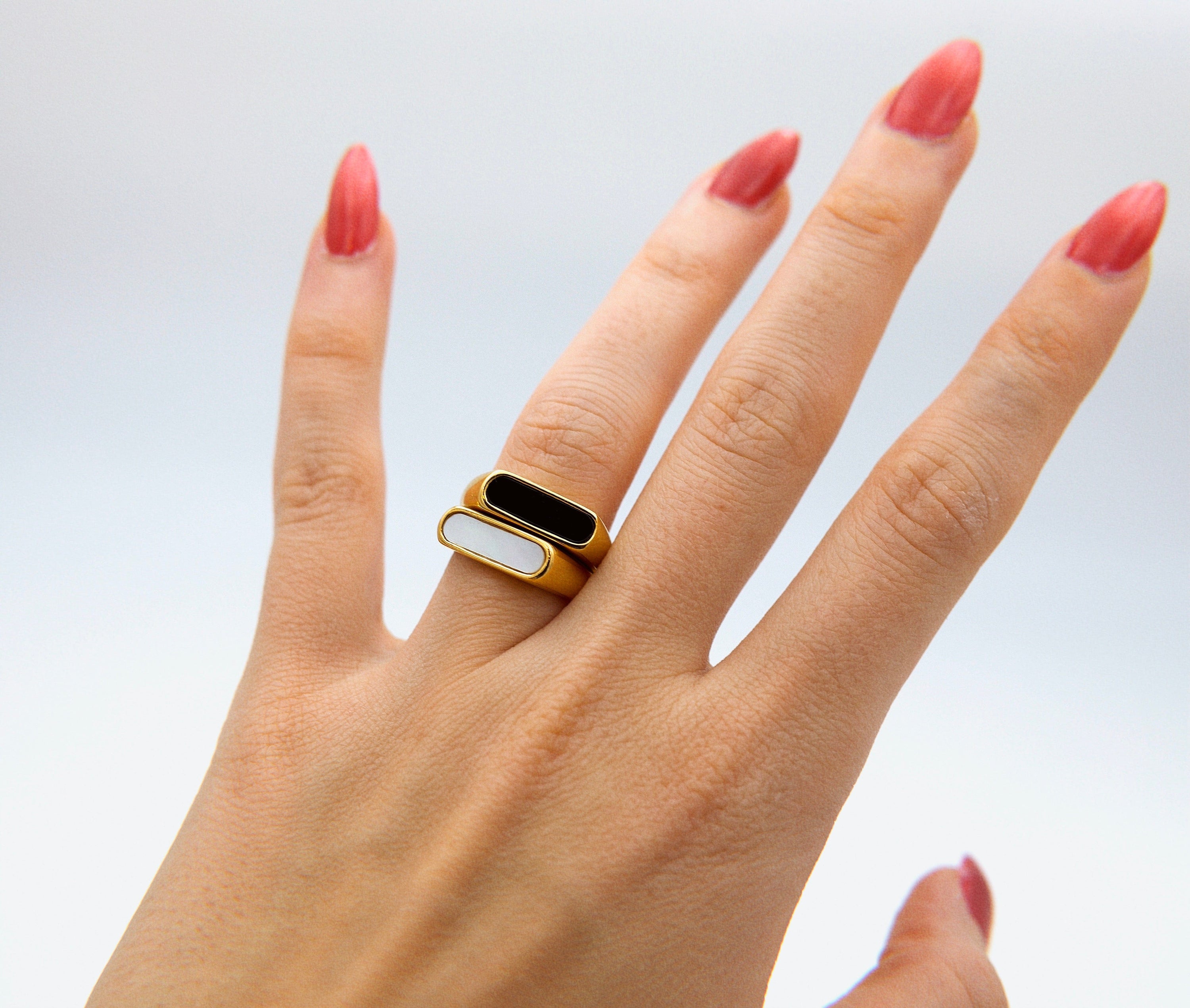 Clementine Thin Signet Enamel Ring featuring a minimalist geometric design with black enamel stone and 18k gold plated stainless steel.