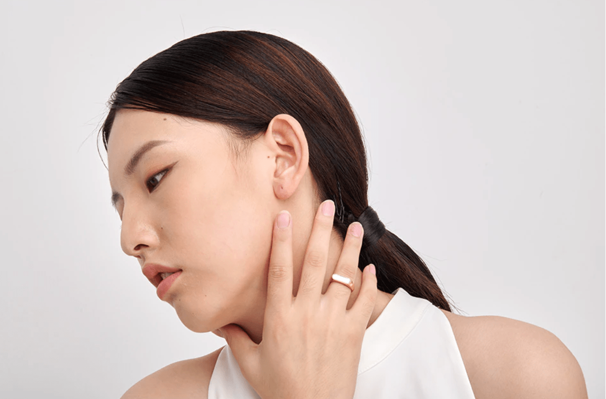 Clementine Thin Signet Shell Ring featuring 18k gold plated stainless steel and natural white shell stone, showcasing a minimalist geometric design.