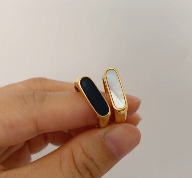 Clementine Thin Signet Shell Ring featuring 18k gold plated stainless steel and natural white shell stone, showcasing a minimalist geometric design.