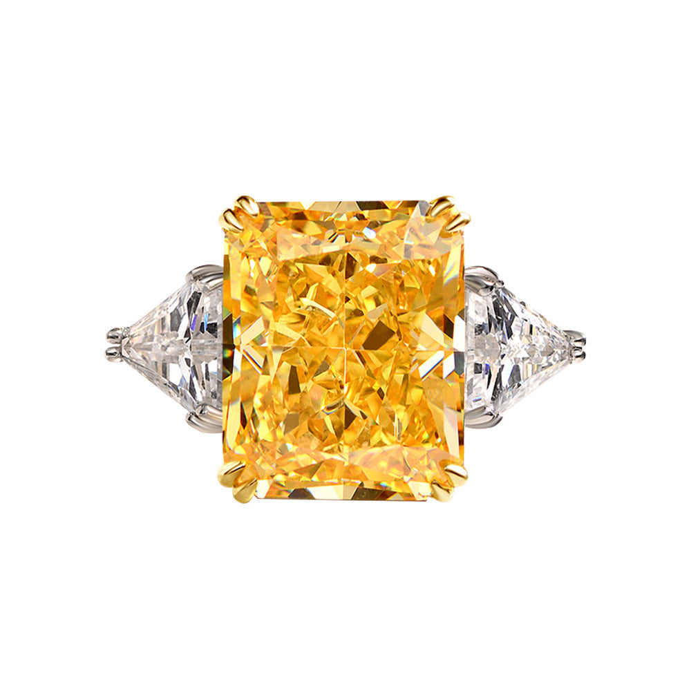 Cocktail Anniversary Fashion Ring featuring a cushion canary yellow cubic zirconia and sterling silver setting, showcasing a bold and elegant design.