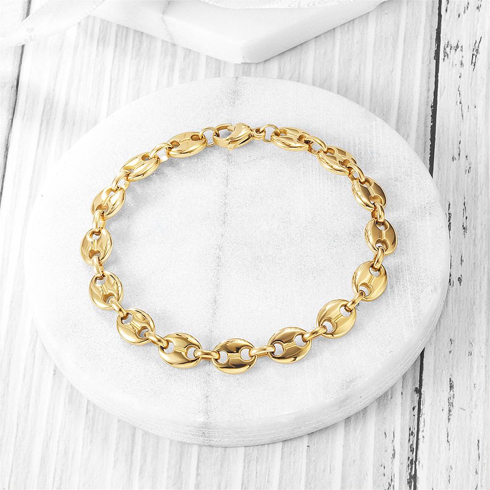 A stylish Coffee Bean Chain Bracelet made of 316L surgical stainless steel with 14K gold PVD plating, showcasing its elegant design.