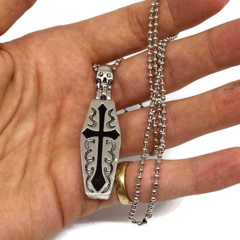 Coffin x Skeleton Necklace featuring a unique coffin and skeleton pendant on a 50cm chain, crafted from sterling silver plated steel alloy.