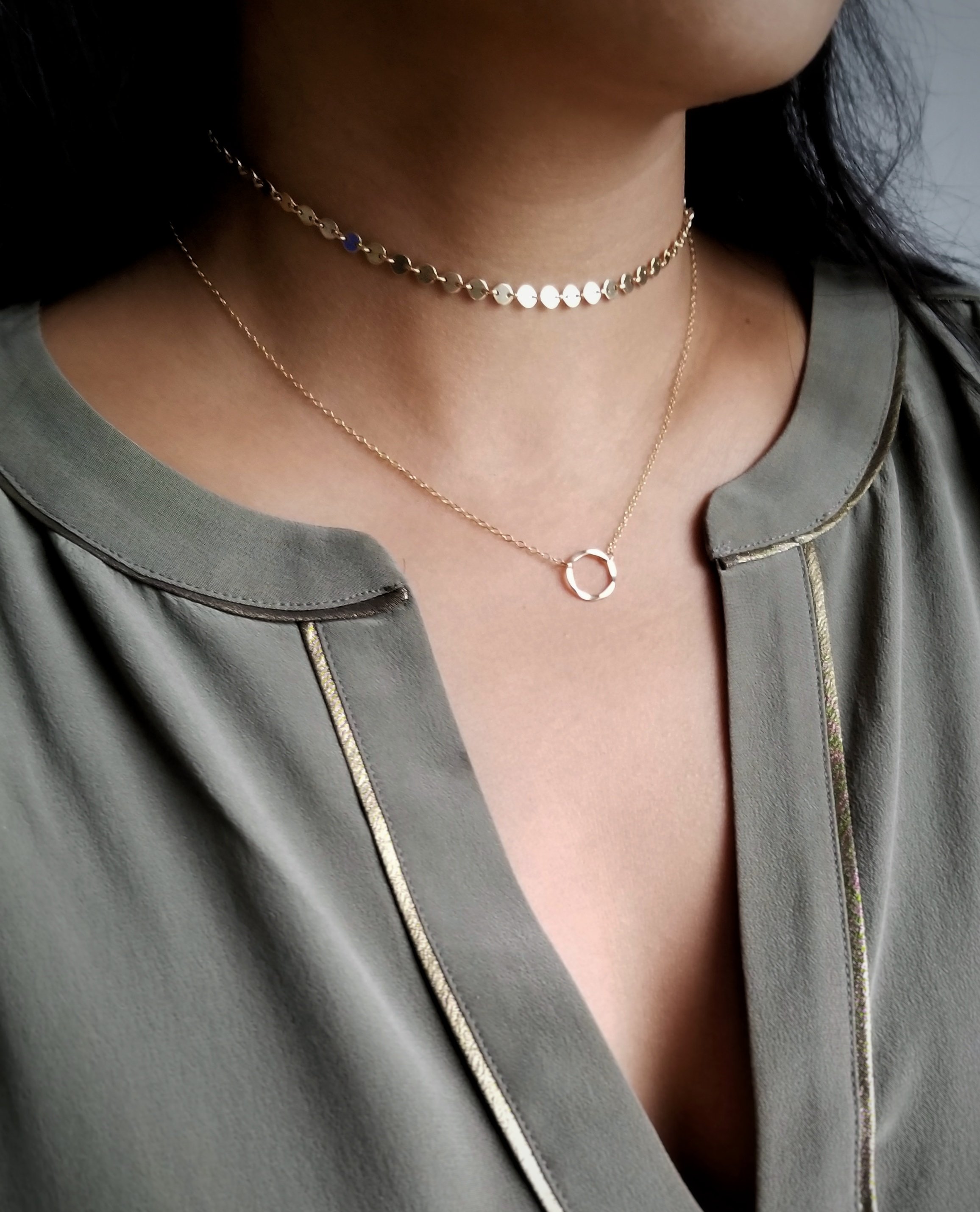 A beautiful Coin Choker featuring a minimalist design with a 4mm pendant, crafted from 14KT gold-filled material, perfect for layering or wearing alone.