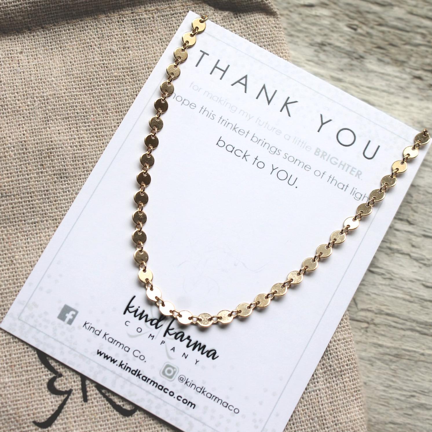 A beautiful Coin Choker featuring a minimalist design with a 4mm pendant, crafted from 14KT gold-filled material, perfect for layering or wearing alone.