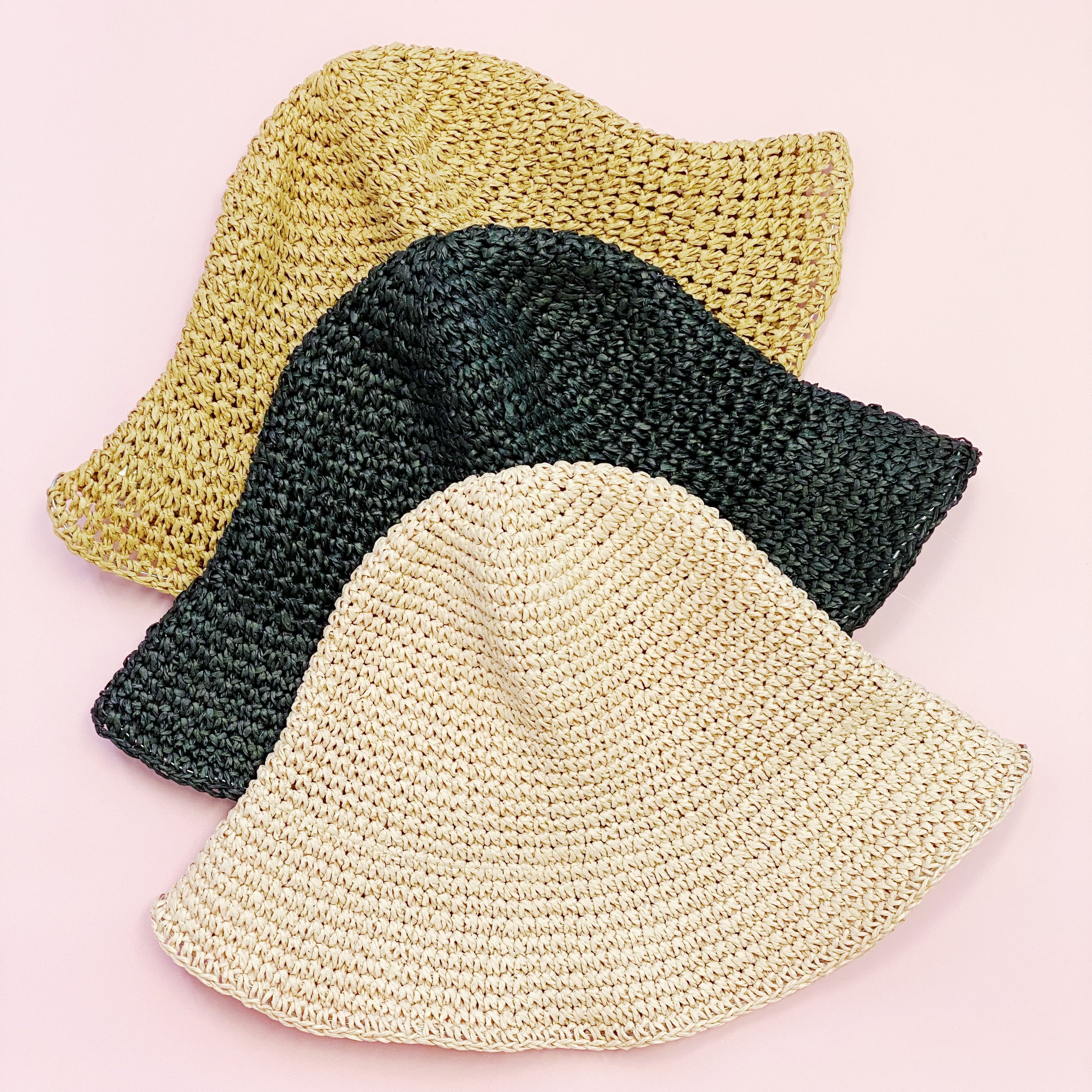 Collapsible Summer Bucket Hat made of straw with a moldable wire brim, perfect for summer outings and travel.