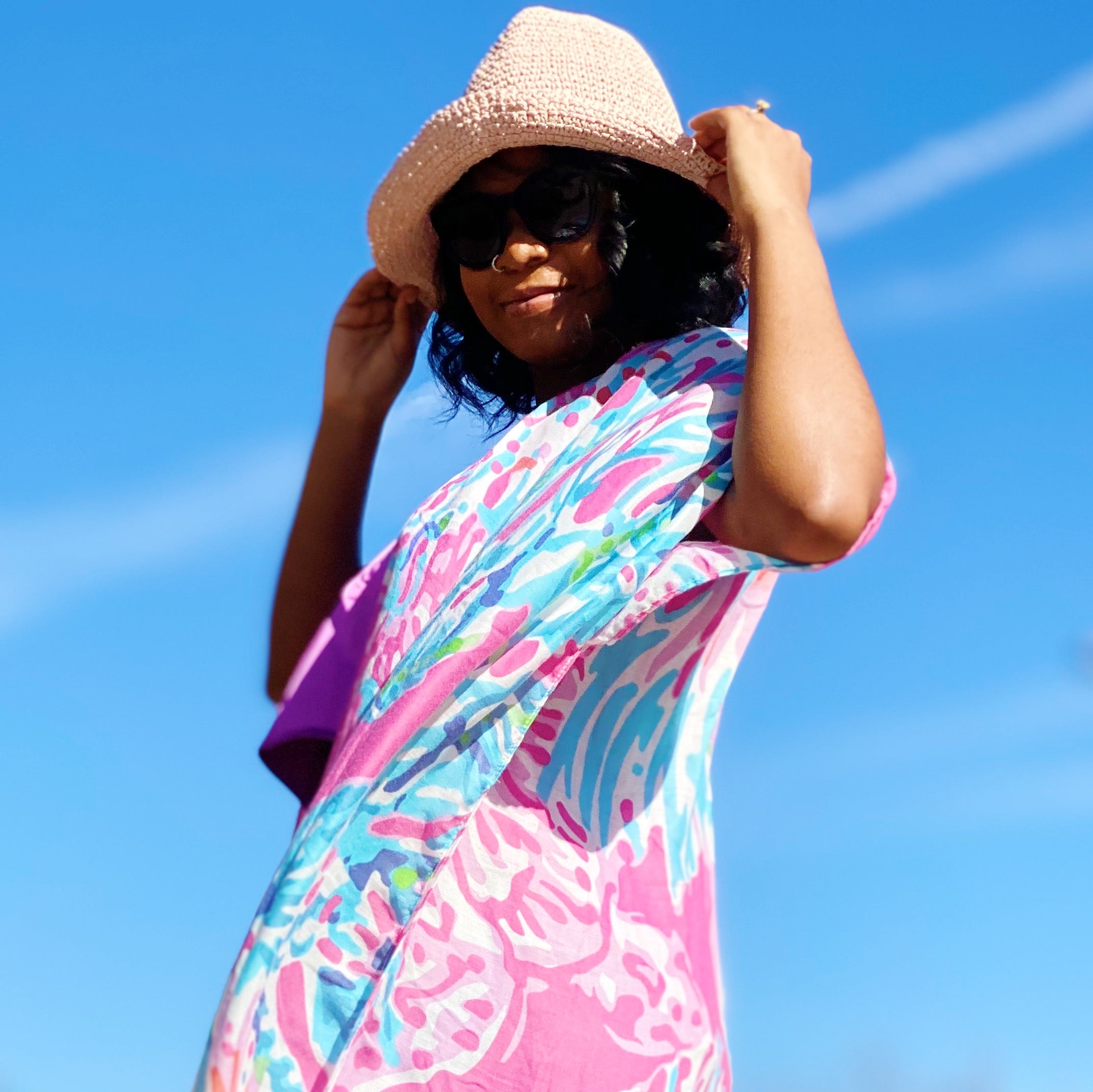 Collapsible Summer Bucket Hat made of straw with a moldable wire brim, perfect for summer outings and travel.