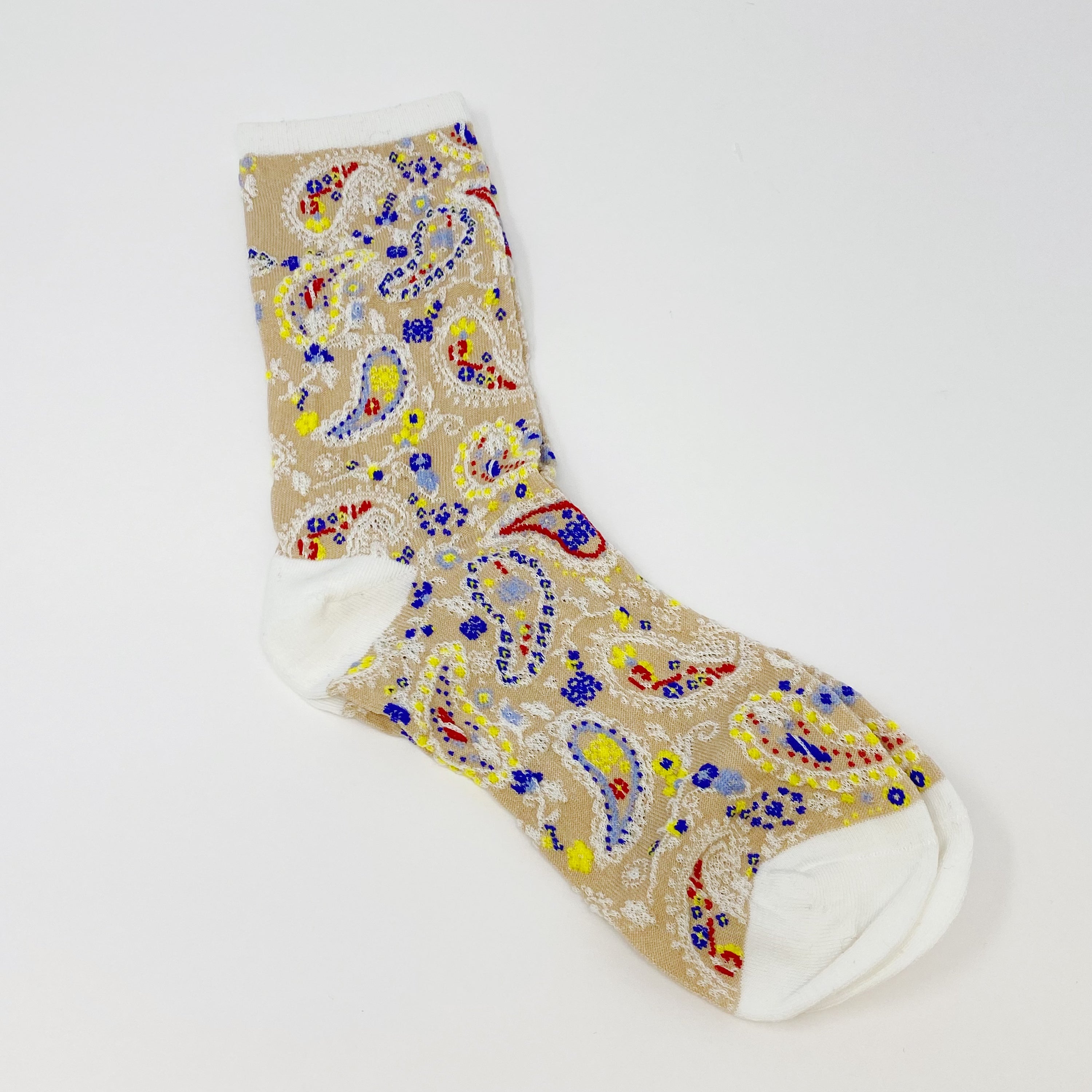 Color Heaven Paisley Socks Set featuring two pairs of stylish socks with vibrant paisley patterns, packaged in a clear cello bag.