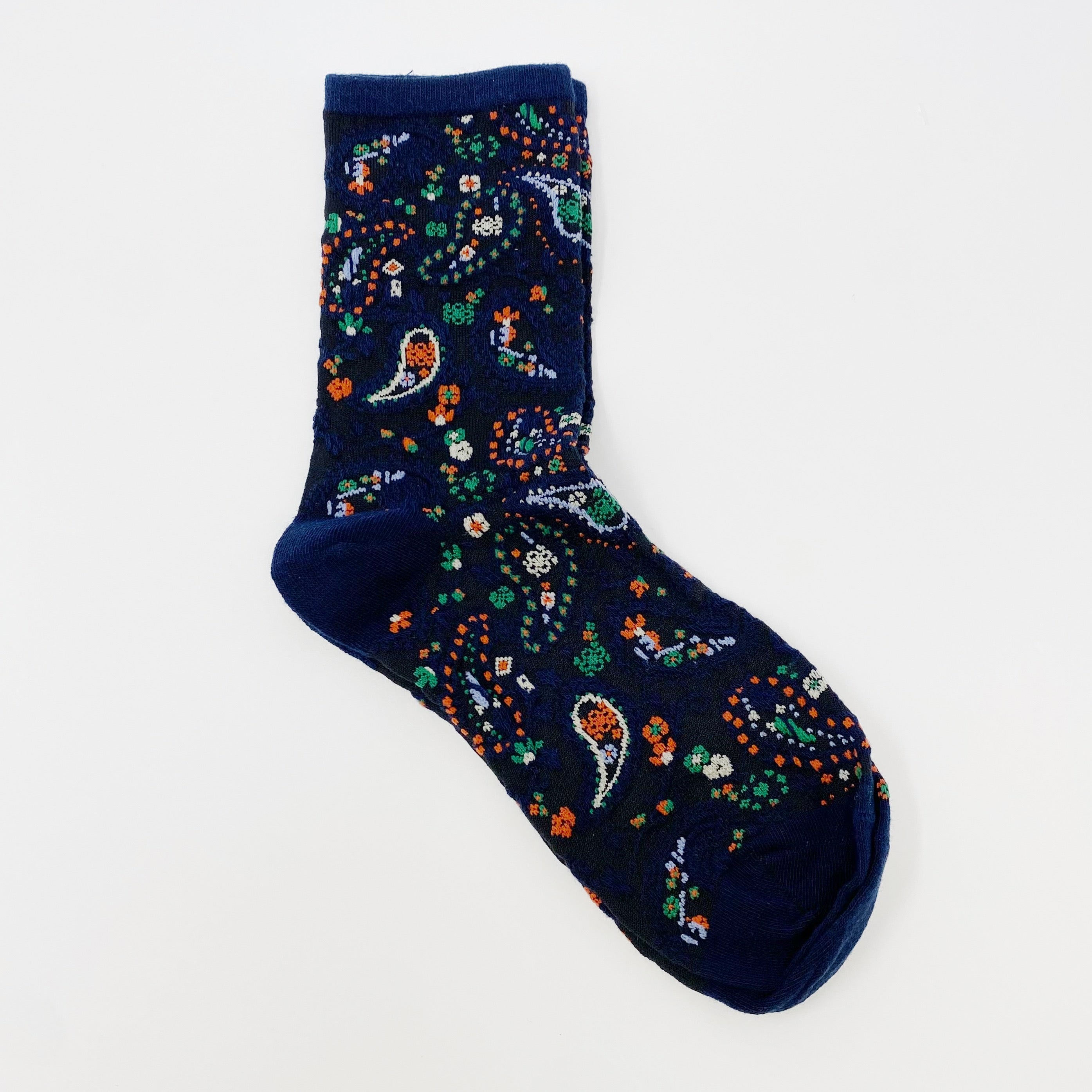 Color Heaven Paisley Socks Set featuring two pairs of stylish socks with vibrant paisley patterns, packaged in a clear cello bag.