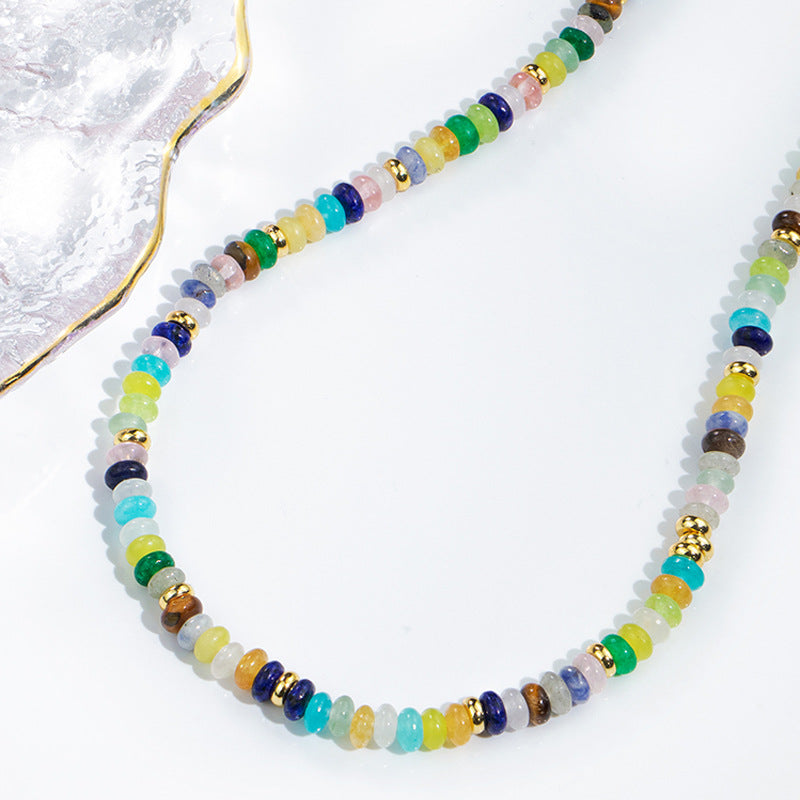 A vibrant mint mambo beaded necklace with playful colors, designed to uplift and energize any outfit.