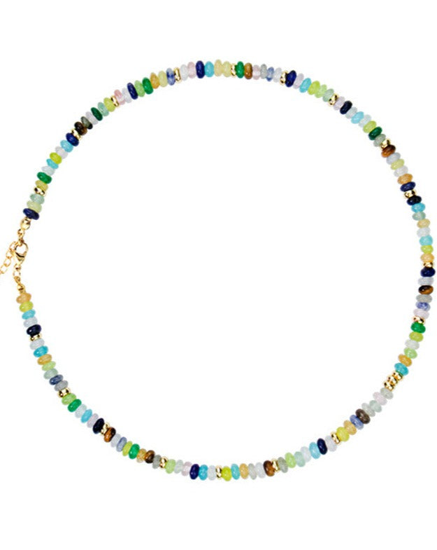 A vibrant mint mambo beaded necklace with playful colors, designed to uplift and energize any outfit.