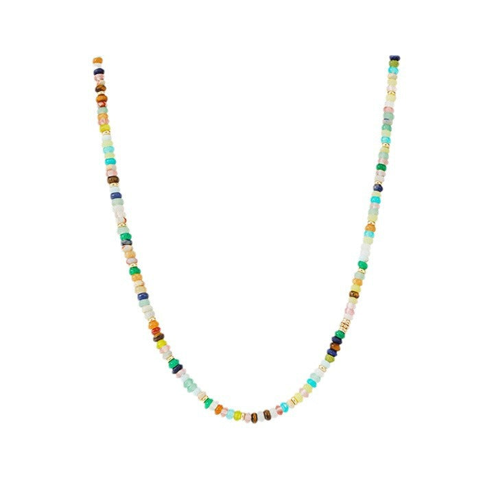 A vibrant mint mambo beaded necklace with playful colors, designed to uplift and energize any outfit.