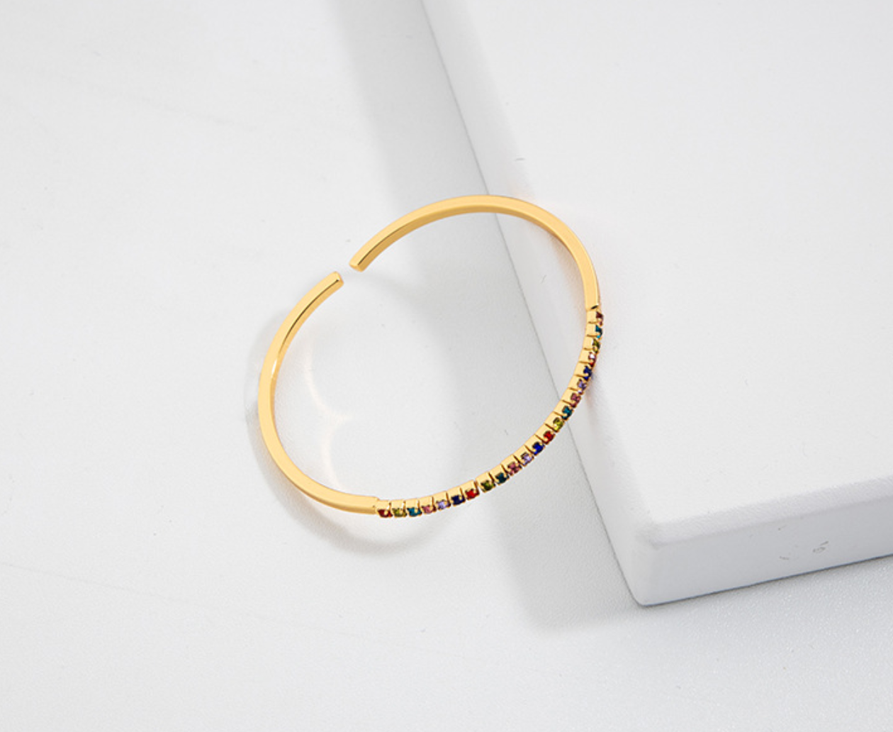 A colorful stone adjustable bracelet featuring vibrant stones and a sleek design, perfect for any wrist size.