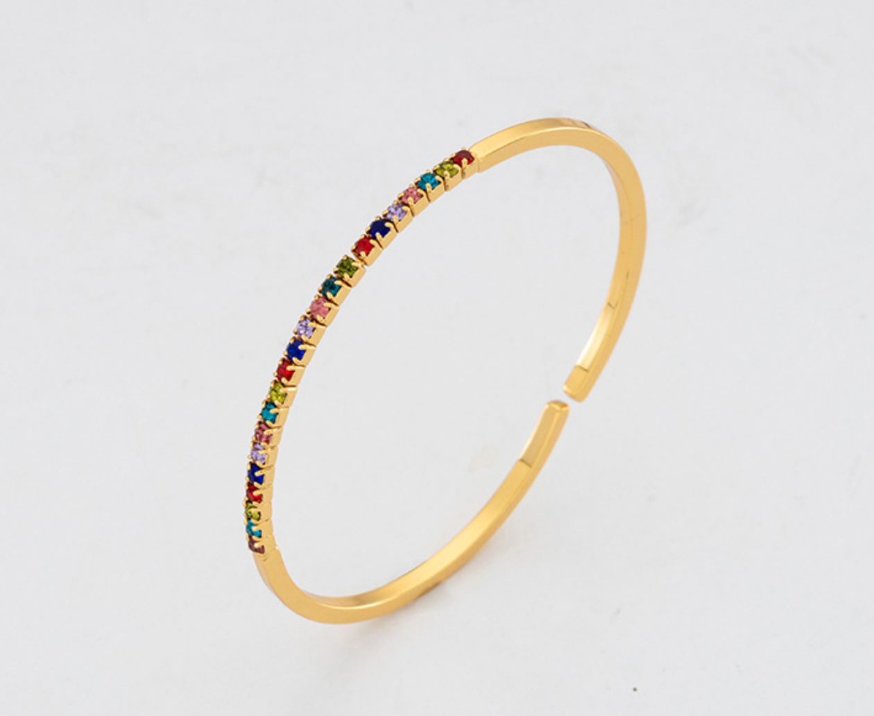 A colorful stone adjustable bracelet featuring vibrant stones and a sleek design, perfect for any wrist size.